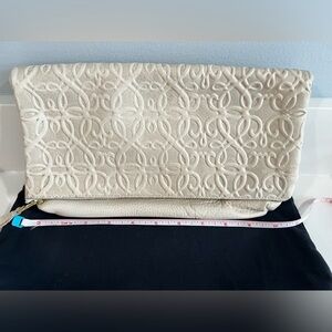 Alex and Ani white/cream signature embossed fold over leather clutch